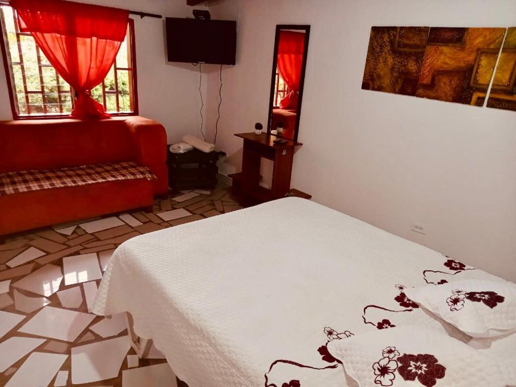 House Panzió Guatapé Kültér fotó
